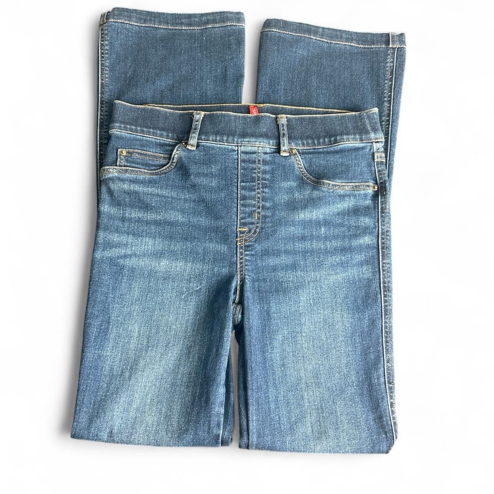 Spanx medium wash women's jeans in a pull-on boot cut/flare style